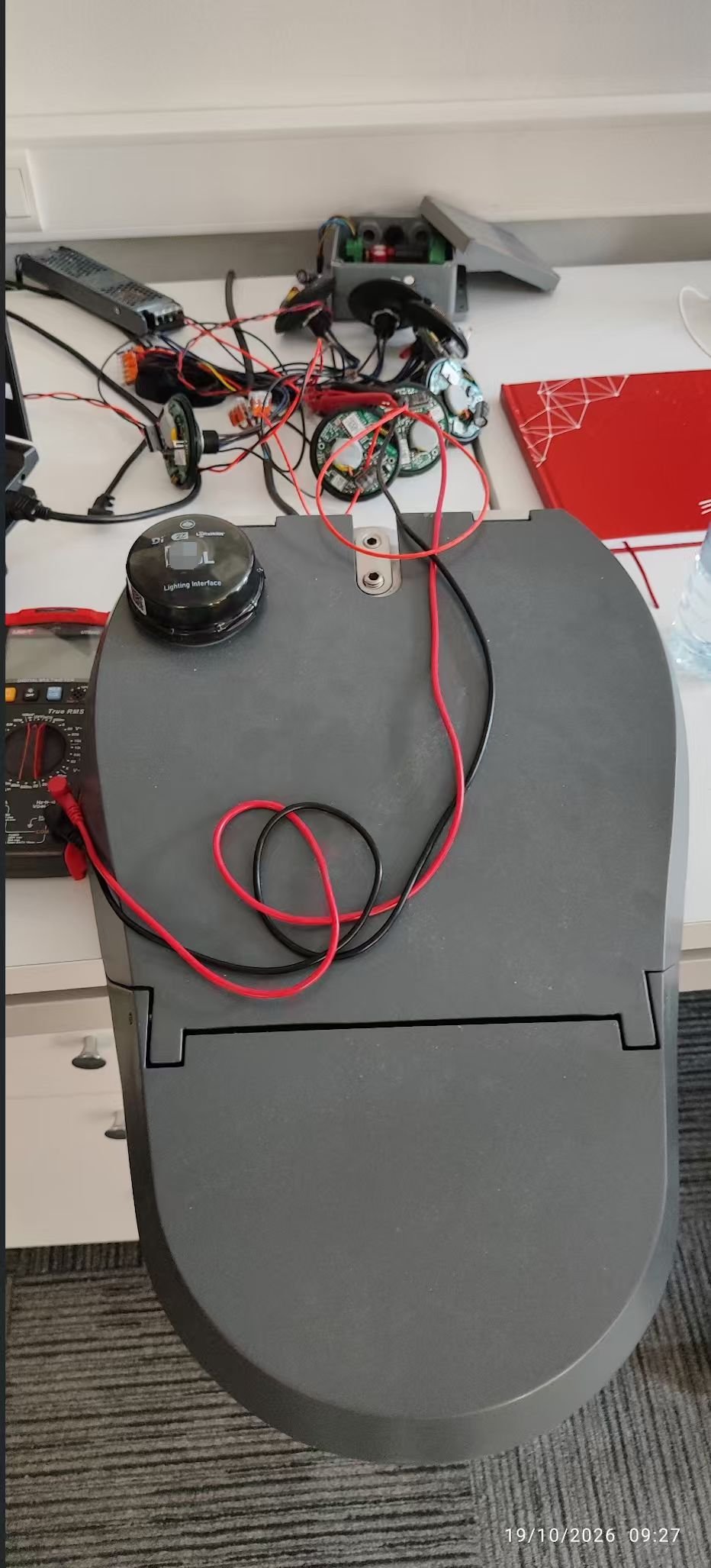 Customer workbench photograph of a lighting controller mounted on a street luminaire in Turkey